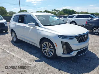 2020 Cadillac XT6 FWD Premium Luxury z VIN 1GYKPCRS1LZ228982, wystawiony jako IAAI lot #41975364 z przebiegiem 84 803 mil mil oraz . Historia ofert i sprzedaży dostępna na DreamBid. Obrazek 1.