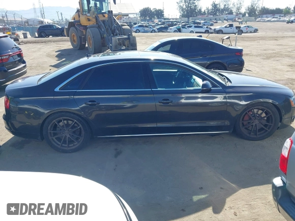2011 Audi A8 with VIN WAURVAFD9BN014362, listed as a IAAI auction lot 41960366 with 135,244 mi miles and . Bid and sale history available at DreamBid. Image 13.