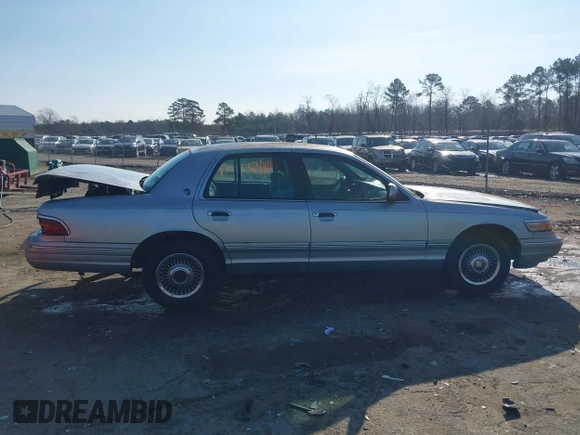 1996 Mercury Grand Marquis GS with VIN 2MELM74W7TX702815, listed as a IAAI auction lot 41452207 with 269,305 mi miles and . Bid and sale history available at DreamBid. Image 12.
