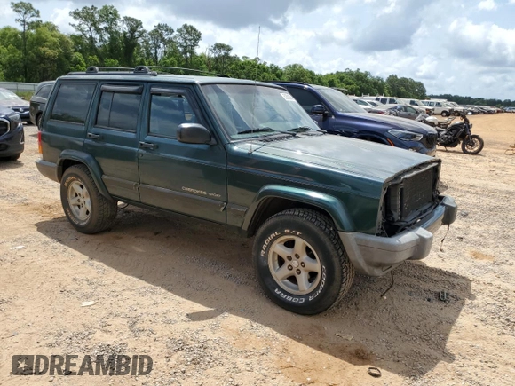 2001 Jeep Cherokee Sport with VIN 1J4FT48SX1L590135, listed as a Copart auction lot 53502945 with 362,941 mi miles and Non Repairable. Bid and sale history available at carsss.com. Image 4.
