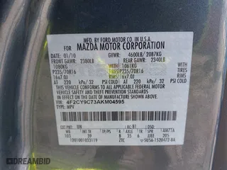 2010 Mazda Tribute Touring with VIN 4F2CY9C73AKM04595, listed as a IAAI auction lot 40797681 with 122,774 mi miles. Bid and sale history available at carsss.com. Image 9.