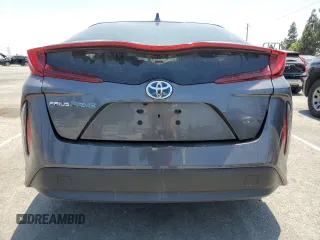 2021 Toyota Prius LE z VIN JTDKAMFPXM3174518, wystawiony jako Copart lot #58854495 z przebiegiem 83 445 mil mil oraz Szkoda całkowita • Salvage title. Historia ofert i sprzedaży dostępna na DreamBid. Obrazek 6.