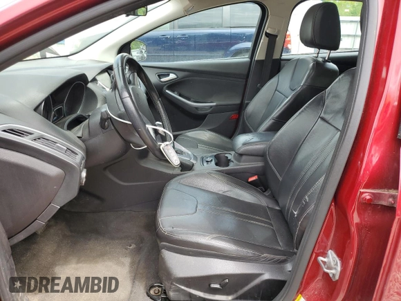 2014 Ford Focus Titanium with VIN 1FADP3J20EL352909, listed as a Copart auction lot 58501085 with 174,388 mi miles and Salvage title. Bid and sale history available at DreamBid. Image 7.