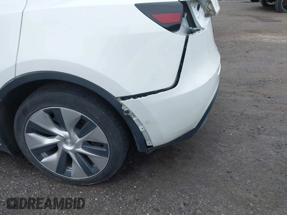 2022 Tesla Model Y Long Range z VIN 7SAYGDEE7NF389788, wystawiony jako IAAI lot #42014111 z przebiegiem 37 606 mil mil oraz . Historia ofert i sprzedaży dostępna na DreamBid. Obrazek 21.