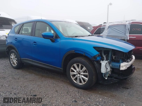 2013 Mazda CX-5 Sport with VIN JM3KE4BE9D0157890, listed as a IAAI auction lot 40998406 with 134,087 mi miles. Bid and sale history available at carsss.com. Image 1.