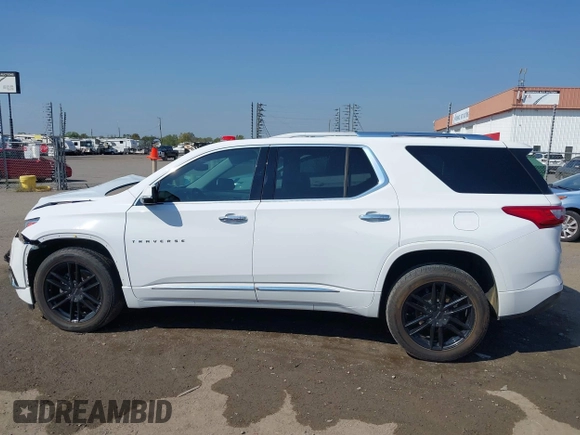 2018 Chevrolet Traverse Premier z VIN 1GNERKKW6JJ220965, wystawiony jako IAAI lot #37625637 z przebiegiem 99 072 mil mil oraz . Historia ofert i sprzedaży dostępna na DreamBid. Obrazek 15.