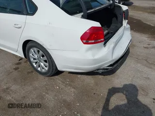 2014 Volkswagen Passat S с VIN 1VWAT7A34EC061268, выставлен на аукционе IAAI как лот 42288756 с пробегом 104 477 миль миль и . История ставок и продаж доступна на DreamBid. Изображение 6.