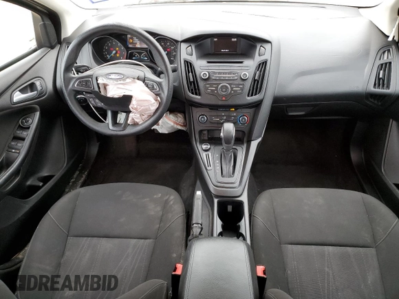 2017 Ford Focus SE z VIN 1FADP3F29HL304872, wystawiony jako Copart lot #55132865 z przebiegiem 79 831 mil mil oraz Szkoda całkowita • Salvage title. Historia ofert i sprzedaży dostępna na DreamBid. Obrazek 8.