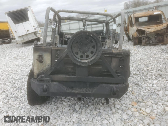2004 Jeep Wrangler Rubicon with VIN 1J4FA69S74P787812, listed as a Copart auction lot 49821695 with Not provided miles and Salvage title. Bid and sale history available at DreamBid. Image 6.