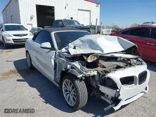 2015 BMW 2 Series 228i with VIN WBA1K5C50FV474011, listed as a IAAI auction lot 41805879 with 83,489 mi miles. Bid and sale history available at carsss.com. Image 5.