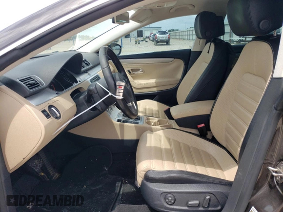 2014 Volkswagen CC R-Line with VIN WVWBN7ANXEE507477, listed as a Copart auction lot 58546374 with 73,792 mi miles and Salvage Title. Bid and sale history available at carsss.com. Image 7.