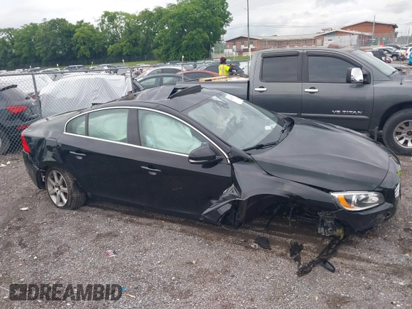 2016 Volvo S60 T5 Premier z VIN YV1612TK3G2411949, wystawiony jako IAAI lot #42353357 z przebiegiem 152 937 mil mil oraz . Historia ofert i sprzedaży dostępna na DreamBid. Obrazek 12.