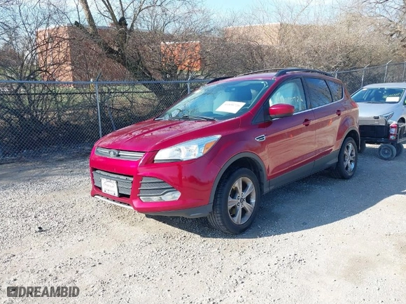 2014 Ford Escape SE with VIN 1FMCU0GX1EUC94976, listed as a IAAI auction lot 41890726 with 119,097 mi miles. Bid and sale history available at carsss.com. Image 2.