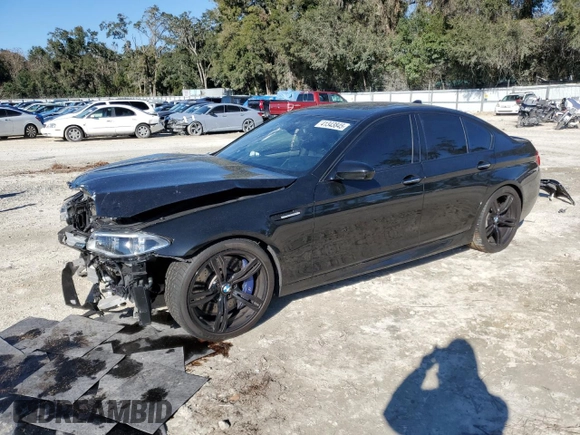 2016 BMW M5 with VIN WBSFV9C57GD595447, listed as a Copart auction lot 41343845 with 50,029 mi miles and Salvage Title. Bid and sale history available at carsss.com. Image 1.