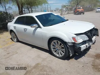 2012 Chrysler 300 Limited z VIN 2C3CCACGXCH165920, wystawiony jako IAAI lot #42338679 z przebiegiem 214 508 mil mil oraz . Historia ofert i sprzedaży dostępna na DreamBid. Obrazek 1.