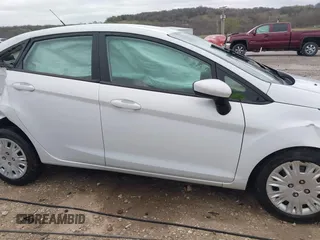 2018 Ford Fiesta S with VIN 3FADP4AJ8JM124873, listed as a IAAI auction lot 41833956 with 86,759 mi miles and . Bid and sale history available at DreamBid. Image 14.