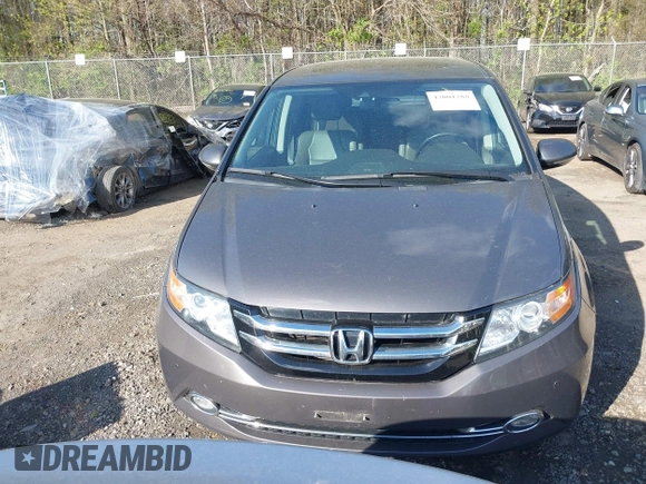 2015 Honda Odyssey Touring Elite with VIN 5FNRL5H99FB094727, listed as a IAAI auction lot 42001288 with 254,015 mi miles and . Bid and sale history available at DreamBid. Image 13.