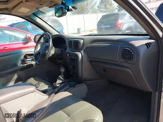 2004 Chevrolet TrailBlazer LS with VIN 1GNDT13S442119957, listed as a IAAI auction lot 41760671 with 233,032 mi miles. Bid and sale history available at carsss.com. Image 5.
