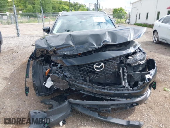 2024 Mazda CX-50 S Premium with VIN 7MMVABDM0RN185128, listed as a IAAI auction lot 42383177 with 21,267 mi miles and . Bid and sale history available at DreamBid. Image 12.