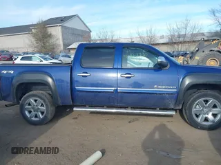 2012 GMC Sierra 1500 SLT with VIN 3GTP2WE78CG292997, listed as a IAAI auction lot 40967330 with 129,462 mi miles and . Bid and sale history available at DreamBid. Image 13.
