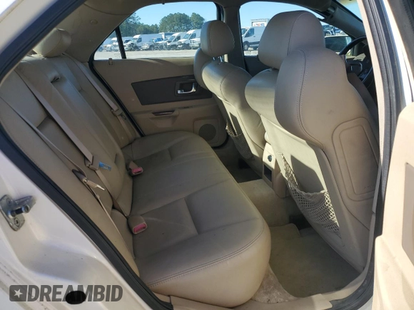 2006 Cadillac CTS z VIN 1G6DP577960123627, wystawiony jako Copart lot #49327275 z przebiegiem 168 605 mil mil oraz Szkoda całkowita • Salvage title. Historia ofert i sprzedaży dostępna na DreamBid. Obrazek 10.