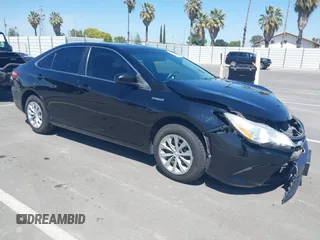 2015 Toyota Camry LE z VIN 4T1BD1FK9FU167532, wystawiony jako IAAI lot #42175331 z przebiegiem 53 889 mil mil oraz . Historia ofert i sprzedaży dostępna na DreamBid. Obrazek 1.
