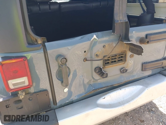 2014 Jeep Wrangler Unlimited Sahara with VIN 1C4BJWEG5EL326980, listed as a IAAI auction lot 42031659 with 116,181 mi miles and . Bid and sale history available at DreamBid. Image 17.