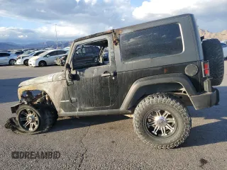 2009 Jeep Wrangler Rubicon with VIN 1J4GA64119L762714, listed as a Copart auction lot 80943364 with Not Provided miles and Salvage Title. Bid and sale history available at DreamBid. Image 2.
