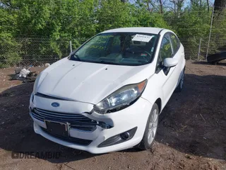 2019 Ford Fiesta SE z VIN 3FADP4BJ9KM136689, wystawiony jako IAAI lot #42095835 z przebiegiem 80 856 mil mil oraz . Historia ofert i sprzedaży dostępna na DreamBid. Obrazek 16.