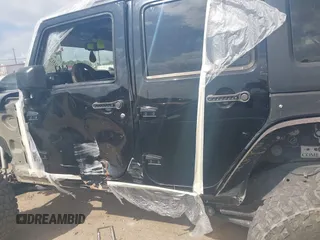 2014 Jeep Wrangler Unlimited Rubicon X with VIN 1C4HJWFG3EL274905, listed as a IAAI auction lot 41512631 with 123,961 mi miles and . Bid and sale history available at DreamBid. Image 15.