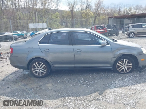 2005 Volkswagen Jetta Sedan 2.5L with VIN 3VWSG71K35M617763, listed as a IAAI auction lot 41963065 with 200,915 mi miles. Bid and sale history available at carsss.com. Image 13.
