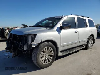 2015 Nissan Armada Platinum z VIN 5N1BA0NF6FN602931, wystawiony jako Copart lot #82023924 z przebiegiem 211 123 mil mil oraz Czysty tytuł • Clean title. Historia ofert i sprzedaży dostępna na DreamBid. Obrazek 1.
