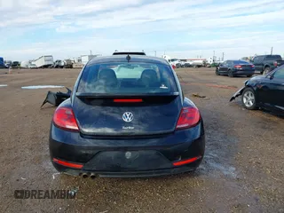 2018 Volkswagen Beetle S with VIN 3VWFD7ATXJM706338, listed as a IAAI auction lot 41293181 with 71,945 mi miles. Bid and sale history available at carsss.com. Image 17.