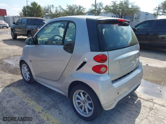 2012 Smart fortwo Pure with VIN WMEEJ3BA1CK560131, listed as a IAAI auction lot 41540976 with NaN miles. Bid and sale history available at carsss.com. Image 3.