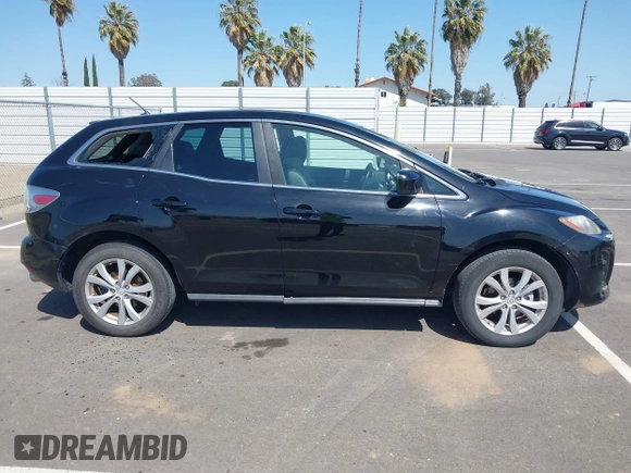 2011 Mazda CX-7 s Touring with VIN JM3ER4C32B0356372, listed as a IAAI auction lot 42003608 with 127,071 mi miles. Bid and sale history available at carsss.com. Image 13.