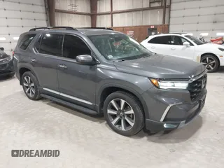 2023 Honda Pilot Elite with VIN 5FNYG1H80PB026995, listed as a IAAI auction lot 42059121 with 108,781 mi miles and . Bid and sale history available at DreamBid. Image 1.
