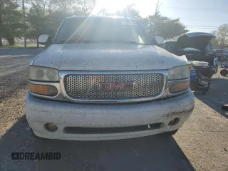 2006 GMC Sierra Denali z VIN 2GTEK63N961143391, wystawiony jako Copart lot #73767264 z przebiegiem Nie podano mil oraz Szkody całkowita. Historia ofert i sprzedaży dostępna na DreamBid. Obrazek 5.