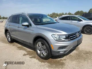 2021 Volkswagen Tiguan SE with VIN 3VV3B7AX8MM115493, listed as a Copart auction lot 71198794 with 34,958 mi miles and Salvage Title. Bid and sale history available at DreamBid. Image 4.