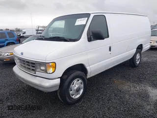 1996 Ford Econoline Cargo with VIN 1FTJS34H4THA69893, listed as a IAAI auction lot 41703257 with 206,503 mi miles and . Bid and sale history available at DreamBid. Image 2.