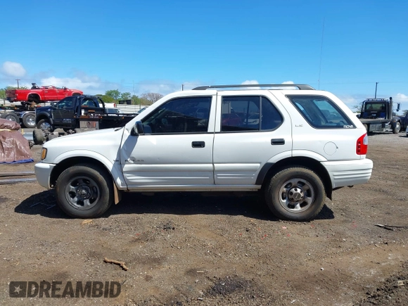 2000 Isuzu Rodeo S with VIN 4S2CK58W6Y4355597, listed as a IAAI auction lot 41775764 with 122,776 mi miles. Bid and sale history available at carsss.com. Image 14.