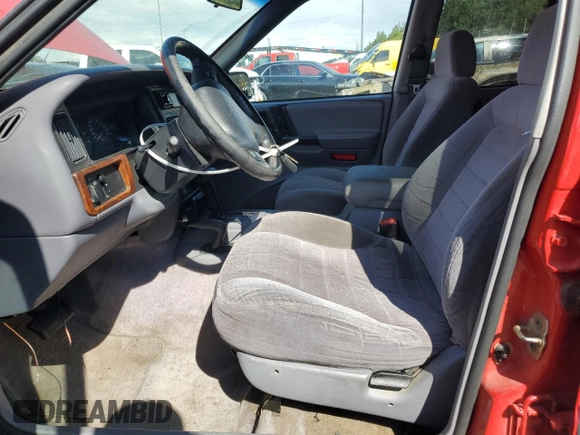 1996 Jeep Grand Cherokee Laredo with VIN 1J4GZ58S0TC170623, listed as a Copart auction lot 68019014 with 174,192 mi miles and Salvage Title. Bid and sale history available at carsss.com. Image 7.