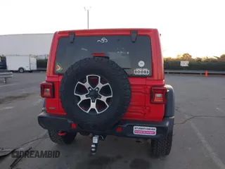 2022 Jeep Wrangler Unlimited Rubicon with VIN 1C4HJXFN4NW261809, listed as a IAAI auction lot 41459519 with 30,422 mi miles and . Bid and sale history available at DreamBid. Image 16.