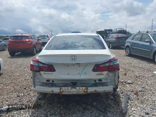 2017 Honda Accord Touring with VIN 1HGCR3F98HA003410, listed as a IAAI auction lot 42534659 with 211,470 mi miles and . Bid and sale history available at DreamBid. Image 17.