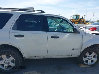 2009 Ford Escape Hybrid with VIN 1FMCU49369KA28954, listed as a IAAI auction lot 42157026 with 205,696 mi miles and . Bid and sale history available at DreamBid. Image 14.