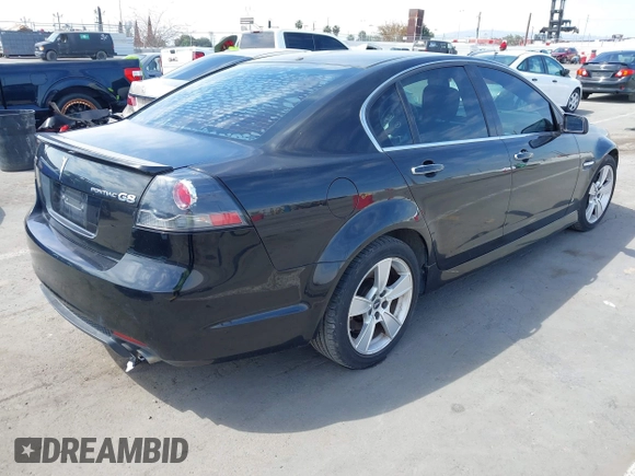 2008 Pontiac G8 GT with VIN 6G2EC57Y18L136838, listed as a IAAI auction lot 42034754 with 152,980 mi miles. Bid and sale history available at carsss.com. Image 4.