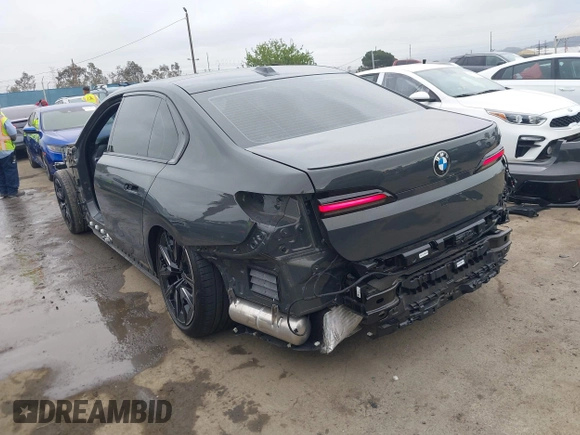 2024 BMW 7 Series 740i with VIN WBA23EH01RCP35452, listed as a IAAI auction lot 42064471 with 13,657 mi miles and . Bid and sale history available at DreamBid. Image 3.