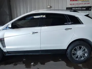 2014 Cadillac SRX Performance Collection with VIN 3GYFNFE36ES615440, listed as a IAAI auction lot 41830849 with 125,128 mi miles and . Bid and sale history available at DreamBid. Image 15.