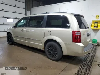 2010 Dodge Grand Caravan Crew with VIN 2D4RN6DX7AR463122, listed as a Copart auction lot 48768635 with 102,497 mi miles and Salvage Title. Bid and sale history available at DreamBid. Image 2.
