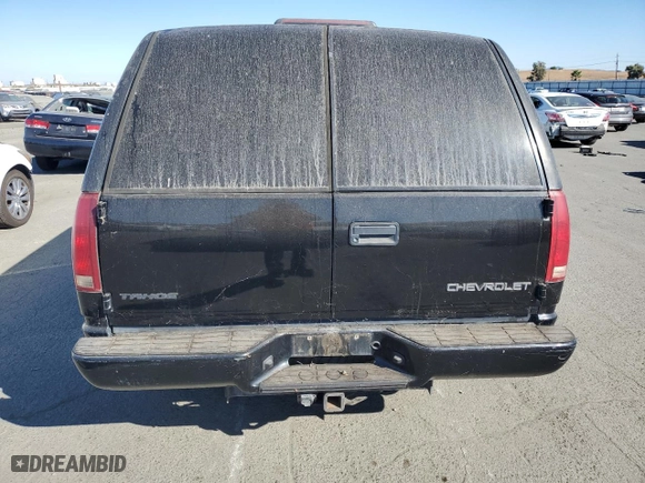 2000 Chevrolet Tahoe Limited with VIN 1GNEC13R7YR221297, listed as a Copart auction lot 75504254 with 246,714 mi miles and Clean Title. Bid and sale history available at carsss.com. Image 6.
