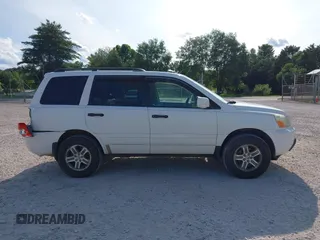 2005 Honda Pilot EX-L with VIN 5FNYF185X5B012415, listed as a IAAI auction lot 42395828 with 246,342 mi miles and . Bid and sale history available at DreamBid. Image 13.